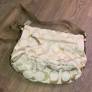 Coach Beige purse Signature Canvas and Leather Hobo bag gold